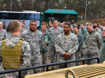 Lt. Gen. Richard M. Clark, 3rd Air Force commander, and Chief Master Sgt. Phillip Easton, U.S. Air Forces in Europe and Air Forces Africa command chief, receive a brief from Staff Sgt. McKenzie Lauber, 1st Combat Communications Squadron combat readiness instructor, during an immersion tour of the 435th Air Ground Operations Wing Feb. 3 on Ramstein. Clark and Easton toured squadrons within the wing’s three local groups, ate lunch with several 435 AGOW Airmen and spoke at a commander’s call during the tour.
