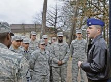 Lt. Col. Richard D. Engelman, 786th Civil Engineer Squadron commander, briefs his Airmen about the history of the River Rats Memorial monument Feb. 17 on Ramstein. The monument was established by Red River Rats Fighter Pilots Association Ramstein in 1976 to commemorate those who lost their lives in the Vietnam War.