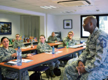 Senior Master Sgt. DeMarcus Tate, U.S. Air Forces in Europe and Air Forces Africa superintendent of military personnel branch, conducts a briefing during a professional enhancement seminar March 7 on Ramstein. Newly promoted master sergeants met in order to gain additional leadership skills and refresh themselves on what it means to be part of the Air Force's highest enlisted tier.