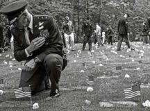Maj. Gen. Timothy M. Zadalis, U.S. Air Forces in Europe and Air Forces Africa vice commander, pays his respects at the gravestone for Gary Currie, an infant who lost his life in 1952, during the Ramstein Area Chiefs’ Group and German-American and International Women’s Club’s Kindergraves Memorial Service May 20 in Kaiserslautern. Zadalis presided over a dedication ceremony for Gary at the Kindergraves in October of 2016.