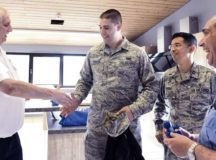 Staff Sgt. Jacob Johnson, 86th Airlift Wing Chapel education and training noncommissioned officer in-charge, center, shakes hands with 86 AW personnel as part of a religious support team during a unit engagement May 18 on Ramstein. Johnson earned the U.S. Air Force Chaplain Corps Richard C. Schneider Award 2016 for Outstanding Chaplain Assistant Airman for his exceptional duties at Edwards Air Force Base, California, and Ramstein.