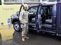 Master Sgt. Desmond Burgess, 773rd Civil Support Team communication chief, explains the capabilities of the unit’s new Unified Command Suite vehicle during a ribbon-cutting ceremony Aug. 10 on Panzer Kaserne.
