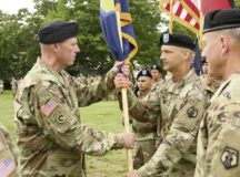 Photos by Capt. Kaitlyn Heacock
Brig. Gen. Frederick R. Maiocco Jr. (left) hands the 7th Mission Support Command unit guidon over to Command Sgt. Maj. Raymond Brown, during the 7 MSC change of command ceremony Aug. 4 on Daenner Kaserne. Observing is Brig. Gen. Steven Ainsworth (foreground right), the outgoing commanding general, and Maj. Gen. Steven Shapiro (foreground left), commanding general of the 21st Theater Sustainment Command, 7 MSC’s higher headquarters.