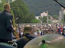 A crowd listens to the Ambassadors, the U.S. Air Forces in Europe jazz band, as they play music for the 73rd anniversary of the Slovak National Uprising Aug. 29 in Banská Bystrica, Slovakia. U.S. bands are invited each year to perform for the celebration. Participating in events with NATO allies improves interoperability and strengthens long standing relationships.