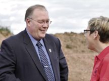 Kevin L. Griess, Ph.D. (Left), the new U.S. Army Garrison Rheinland-Pfalz deputy to the garrison commander, speaks to Penelope A. Miller-Smith, Kaiserslautern Elementary School principal, at the KES ground breaking ceremony Sept. 29 at Vogelweh. — Photo by Mary Ann Davis