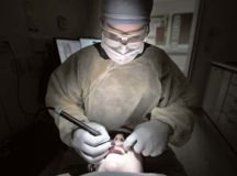 Staff Sgt. Ashley Majewski, 86th Dental Squadron oral preventative assistant, cleans the teeth of Senior Airman Jordan Burge, 86th Munitions Squadron tactical air munition rapid response package technician, during a routine appointment at the dental clinic Feb. 8 on Ramstein Air Base. Majewski said it’s rewarding to clean off a patient’s teeth and watch them walk away like a brand new person.