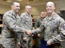 Master Sgt. Edward Mann IV, 86th Security Forces Squadron flight chief, left, shakes hands after his graduation from the Phoenix Raven Qualification Course Feb. 12 on Ramstein Air Base. A mobile training team came from Joint Base McGuire-Dix-Lakehurst, New Jersey, to conduct the course within U.S. Air Forces in Europe and Air Forces Africa.