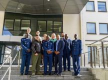 Col. Ric Trimillos, U.S. Air Forces in Europe and Africa International Affairs Division chief, and Department of Defense civilians pose with the official party from the Senegal Air Force Feb. 16 on Ramstein Air Base. The official party consists of Col. Alimbaye Manga, Senegal Air Force Chief of Staff flight safety advisor; Lt. Col. Aliou Faye, Human Resources Division chief; Maj. Mamadou Wathie, Logistics Division chief; and Capt. Momar Ndiaye, Dakar Operational Center chief and transport pilot. — Photos by Airman 1st Class Kristof J. Rixmann
