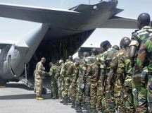 Participants of African Partnership Flight Senegal prepare to board a C-130H Hercules assigned to the 130th Airlift Wing, West Viginia Air National Guard, March 22 at Captain Andalla Cisse Air Base, Senegal. The APF program is U.S. Air Forces Africa’s premier security cooperation program with African partner nations to improve professional military aviation knowledge and skills.