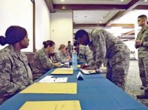 Airmen donate to the Air Force Assistance Fund campaign March 26 on Ramstein Air Base. The AFAF was established to raise funds annually for charitable affiliates that provide support to Air Force members and their families.