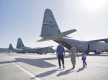 Tech. Sgt. Seth Wilkinson, 86th Aircraft Main­tenance Squadron unit deployment manager, and his son walk with Kyle Rudolph, NFL Minnesota Vikings tight end, to a C-130J during Rudolph’s visit April 7 to Ramstein Air Base. Rudolph spent four days in the Kaiserslautern Military Community. During this time, he toured Ramstein Air Base, Kapaun Air Base, Vogelweh and Sembach. He spoke with Airmen, took pictures with them and signed autographs. On April 7 and 8, Rudolph hosted a football camp at the Kaiserslautern High School football stadium where he emphasized the fundamentals of the game.