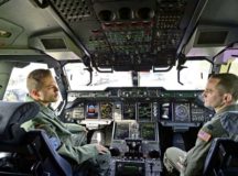 German Air Force 1st Lt. Felix, an A400M Atlas co-pilot, left, discusses the capabilities of his aircraft with U.S. Air Force Capt. Tim Vedra, 37th Airlift Squadron C-130J Super Hercules instructor pilot, in Berlin, April 27. U.S. and German Airmen shared knowledge with each other concerning their respective airframes during the 2018 Berlin Air and Trade Show.