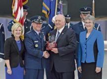 Jay Hone, spouse of Secretary of the Air Force Heather Wilson, is presented an award by Air Force Chief of Staff Gen. David L. Goldfein during the SECAF’s farewell ceremony at Joint Base Andrews, Md., May 21