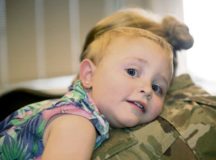 A child shares a hug with her mother at Ramstein Air Base, Aug. 9. To provide more options for parents, the Key and Essential Family Child Care Provider Initiative was created as part of a Kaiserslautern Military Community-wide effort to support military families.