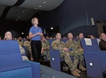 Retired U.S. Air Force Col. Laurel “Buff” Burkel, Air Force Wounded Warrior Program ambassador, speaks to the 86th Airlift Wing at Ramstein Air Base, Oct. 18. Burkel shared her story of recovery and overcoming the obstacles she faced after surviving a helicopter crash on Oct. 11, 2015, in Afghanistan.