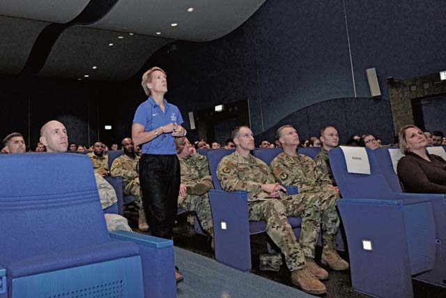 Retired U.S. Air Force Col. Laurel “Buff” Burkel, Air Force Wounded Warrior Program ambassador, speaks to the 86th Airlift Wing at Ramstein Air Base, Oct. 18. Burkel shared her story of recovery and overcoming the obstacles she faced after surviving a helicopter crash on Oct. 11, 2015, in Afghanistan.