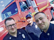 Markus Rademacher, Stephan Uhrig and Ulf Burger pose in front of the water tender near the Villaggio Housing Area in Vicenza Italy in October 2019. (Courtesy Photo)