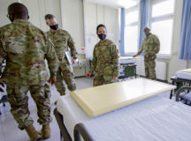 U.S. Army Col. Elba Villacorta, Deputy Commander for Inpatient Services at Landstuhl Regional Medical Center, center, showcases an updated patient room in the new intensive care ward, May 8. The ward, known as 10C to staff members, is intended to supplement current intensive care and medical-surgical wards for post operative and lower acute patients, as well as serve as an overflow COVID-19 ward in the event LRMC’s COVID ICU reaches maximum capacity. Photo by Marcy Sanchez