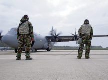 U.S. Air Force Senior Airman Michael Strachan, 86th Aircraft Maintenance Squadron C-130J Super Hercules crew chief, performs flight checks alongside Staff Sgt. Brian Clark, 37th Airlift Squadron C-130J loadmaster, during exercise Operation Varsity 20-04 at Ramstein Air Base, Germany, Oct. 19, 2020. The Airmen checked the aircraft for potential malfunctions as an essential part of maintaining flight readiness. The exercise, held from Oct. 13-23, tested the sustainability and readiness of base personnel. (U.S. Air Force photo by Airman 1st Class Taylor D. Slater)