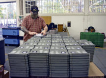 Eric Herron, Department of Defense contractor, preps ballistic vest plates for inspection at Ramstein Air Base, Oct. 29. U.S. Air Forces in Europe is one of the first major commands to scan the plates with X-ray technology and is setting the standard Air Force-wide.