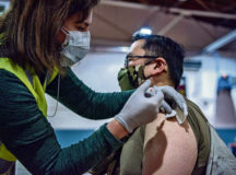 U.S. Air Force Col. (Dr.) Ryan Mihata, 86th Medical Group commander, receives his first dose of the COVID-19 vaccine at Ramstein Air Base, Jan. 4. Initial quantities of the vaccine are limited to first responders and medical personnel. Vaccines will be distributed on a rolling delivery basis as more become available.