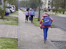 Students walk to school on Ramstein Air Base, Feb. 22. In-person classes resumed for many Department of Defense Education Activity students after a recent lockdown requiring remote learning. (U.S. Air Force photo by Master Sgt. Beatrice M. Brown)