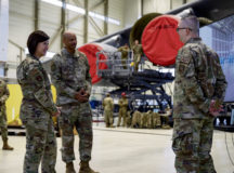 Chief Master Sgt. of the Air Force JoAnne S. Bass meets with Airmen at the 521st Air Mobility Operations Wing hangar during her visit to Ramstein Air Base, Germany, Dec. 1, 2021. Airmen presented capabilities displays to Bass, going over the accomplishments and lessons learned during Operation Allies Welcome. (U.S. Air Force photo by Senior Airman John R. Wright)