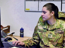 U.S. Air Force Senior Airman Marissa Loya, 37th Airlift Squadron loadmaster, prepares a presentation at Ramstein Air Base, Dec. 9, 2021. Loya was selected for Airlifter of the Week not only because of her ability to execute daily responsibilities efficiently, such as loading and offloading operations, weight and balance composition, and assistance on combat, aeromedical and humanitarian missions, but because of taking on additional duties in her office.