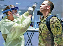 An Army officer assigned to U.S. Army Europe and Africa in Wiesbaden, undergoes a COVID test recently. The CDC has issued updated guidance for COVID testing requirements for military personnel who are on official travel orders departing for the United States from Europe. Courtesy photo