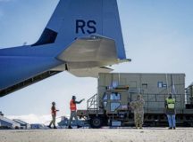 U.S. joint service members work alongside Lithuanian military members to unload cargo from a C-130J Super Hercules assigned to Ramstein Air Base, in Lithuania, Feb. 27. The 86th Airlift Wing’s C-130Js are currently enabling the movement of equipment and personnel throughout Eastern Europe. Photo by Staff Sgt. Jacob Wongwai