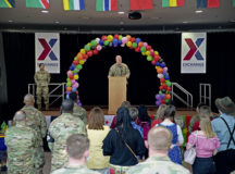 U.S. Air Force Brig. Gen. Josh Olson, 86th Airlift Wing commander, gives opening remarks at Diversity Day 2022 on Ramstein Air Base, Germany, March 24, 2022. The event aimed to enhance cross-cultural and cross-gender awareness while promoting harmony among all military members, their families and the DOD civilian workforce. (U.S. Air Force photo by Senior Airman Branden Rae)