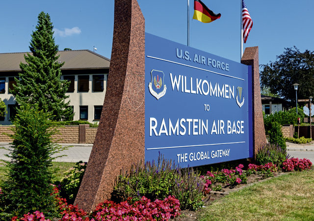 The newly installed welcome sign on display at Ramstein Air Base, Germany, Sept. 2, 2021. The front of the new welcome sign contains both the 86th Airlift Wing and U.S. Air Forces in Europe – Air Forces Africa crest. (U.S. Air Force photo by Airman Edgar Grimaldo)