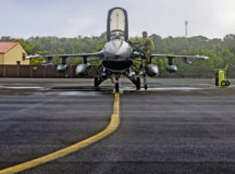 U.S. Air Force Master Sgt. James Thammavongsa, 65th Air Base Group quality assurance superintendent, prepares an F-16 Fighting Falcon aircraft assigned to Shaw Air Force Base, South Carolina, for launch during a coronet mission through Lajes Field, Azores, Portugal, April 27, 2022. The Lajes team provides critical ground maintenance support to multiple aircraft, from bombers and fighters to tankers and cargo. (U.S. Air Force photo by Senior Airman John R. Wright)
