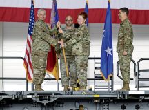 U.S. Air Force Col. Adrienne L. Williams, 521st Air Mobility Operations Wing outgoing commander, relinquishes command during a ceremony at Ramstein Air Base, July 7. The wing provides rapid global mobility support en route in Europe, Africa, and the Middle East through aircraft maintenance, aerial port operations, command and control, expeditionary aircrew support, and aeromedical evacuation. Photo by Airman 1st Class Edgar Grimaldo