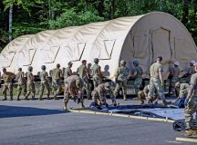 U.S. Air Force Airmen assigned to the 435th Construction Training Squadron finish construction of a pod at Ramstein Air Base, Germany, Aug. 25, 2021. The 435th CTS is supporting Operation Allies Refuge by building pods for incoming evacuees to stay in while they await transportation to other transient locations. (U.S. Air Force photo by Airman Jared Lovett)
