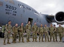 Members from the 721st Air Mobility Operations Group pose for a photo in front of a C-17 Globemaster III at Ramstein Air Base, Germany, Mar. 17, 2022. A seven-member team assigned to the 721st AMOG returned from a deployment to Poland alongside the 435th Air Ground Operations Wing to support Allies and partners in the region. As NATO partners, the U.S. regularly operates with Polish forces to improve collective readiness, interoperability, and strengthen relationships. (U.S. Air Force photo by Senior Airman Faith Schaefer)