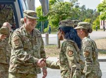 Members of the 86th Airlift Wing welcome U.S. Air Force Gen. James B. Hecker, United States Air Forces in Europe - Air Forces Africa commander, during his tour of the wing at Ramstein Air Base, Aug. 30. During his wing immersion, Hecker met unit leaders and learned about Team Ramstein’s capabilities and challenges. Photo by Senior Airman Andrew Bertain