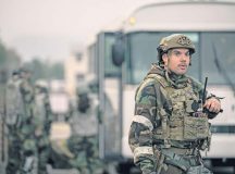U.S. Air Force Technical Sgt. Adam Felts, 86th Security Forces Squadron defender, directs emergency operation center personnel during exercise Operation Varsity 22-4 at Ramstein Air Base, Oct. 20. Wing inspection team members observed Airmen from various units participating in different scenarios to see if proper procedures were followed.