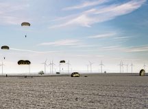 Service members from five NATO Countries land after a static line jump at Alzey Drop Zone, Ober-Flörsheim, Germany, Dec. 16, 2022. Troops from the U.S., Germany, Poland, Czech Republic and Estonia participated in free-fall and static line parachute jumps. These trainings ensure timely and coordinated responses during peacetime and crises. (U.S. Air Force photo by Senior Airman Alexcia Givens)