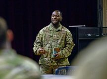U.S Air Force Tech. Sgt. George Linen recites an excerpt from his poem, ‘Black Currently’ to celebrate Martin Luther King Jr. Day during an open mic event at Ramstein Air Base, Germany, Jan. 12, 2023. Martin Luther King Jr.’s birthday became a federal holiday in November 1983 and is officially observed every year on the third Monday in January. (U.S. Air Force photo by Airman 1st Class Regan Spinner)