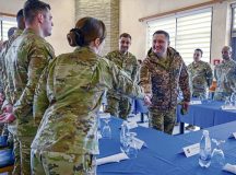 Chief Master Sgt. of the Air Force of the Armed Forces of Ukraine Kostiantyn Stanislavchuk, right, engages with Airmen during a luncheon March 22, 2023, at Spangdahlem Air Base, Germany. The purpose of Chief Stanislavchuk’s visit was to enhance joint nation interoperability and discuss issues affecting the international community of enlisted Airmen. (U.S. Air Force photo by Senior Airman Jessica Sanchez-Chen)