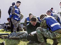 Members of the 86th Medical Group triage and treat simulated patients during exercise Ready Eagle II at Ramstein Air Base, Germany, April 27, 2023. After volunteers were evacuated by firefighters, they were provided with emergency medical care. The 86th MDG personnel practiced their skills by determining the severity of each case before volunteers were transferred to the medical group campus for further treatment. (U.S. Air Force photo by Airman 1st Class Kaitlyn Oiler)