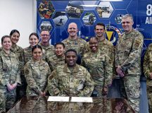 U.S. Air Force Brig. Gen. Otis Jones, 86th Airlift Wing commander, center, poses for a photo with members from the 86th Medical Group after signing the Nurse and Tech Week memorandum at Ramstein Air Base, May, 8. Nurse and Tech Week was created in honor of Florence Nightingale, who was responsible for pioneering and standardizing nursing practices in the late 19th Century and many of the processes are still used today. Photos by Senior Airman Thomas Karol