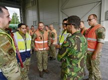 (Left to Right) Tech. Sgt. Michael Lindmark, maintenance training instructor with the 52nd Maintenance Group; Tech. Sgt. Erik Silva, 435th Contingency Response Support Squadron air advisor instructor; First Class Sergeant (OR6) Vyautas Jurevicius, Lithuanian Air Force Chief of Ground support unit; Staff Sgt. Rickey Cline, 435th CRSS air advisor; and Tech. Sgt. Jose Mota, F-16 A Crew Chief for the Portuguese Air Force discuss F-16 refueling during a hot pit refueling familiarization event in Siauliai, Lithuania, July 19. The familiarization event focused on showcasing how to accomplish hot pit refueling, while simultaneously checking equipment synchronization to determine compatibility for real word operations. Photo by Capt. Lou Burton, 435th Air Ground Operations Wing Public Affairs