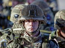British royal air force Lt. Sean Smith, 2nd Battalion parachute regiment, waits to load onto a U.S. C130-J Super Hercules before an Operation Market Garden memorial flight at Eindhoven Air Base, Netherlands, Sept. 16, 2023. Operation Market Garden was conducted by Allied powers during World War II from Sept. 17-27, 1994 in order to open a liberation route into northern Germany and it was split into two phases. Phase one, known as Market, used U.S. and British airborne forces to seize nine bridges. Phase two, known as Garden, used British land forces to further secure the bridges. (U.S. Air Force photo by Senior Airman Jordan Lazaro)