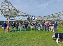 435th Air Ground Operations Wing leaders pose for a group photo at a stop on their battle staff ride on Sep. 25. The staff traveled to various sites of Operation Market Garden, such as drop zones and bridges, to learn more about their wing's historical roots and to honor the Airmen of the 435th who gave their lives during the operation. Courtesy photos