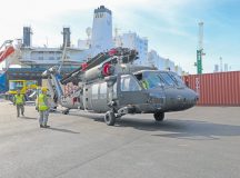 A UH-60 Blackhawk belonging to 1st Infantry Division Combat Aviation Brigade is downloaded from ARC Endurance at the port of Vlissingen, Netherlands, Oct 17.  Aircraft, vehicles, and equipment arrived in theater for a rotational deployment to build readiness, increase interoperability and enhance the bond between ally and partner militaries using multinational training events.