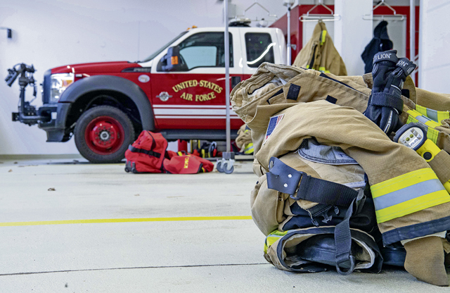 Members of the 86th Civil Engineer Squadron Fire Department prepare to don their gear at Ramstein Air Base, Germany, Nov. 6, 2023. The 86th CES provides fire prevention and emergency services for members of the Kaiserslautern Military Community. (U.S. Air Force photo by Airman Trevor Calvert)