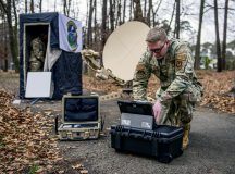 U.S. Air Force Senior Airman Nathaniel De Los Reyes, 1st Air and Space Communications Squadron intel server operations technician, demonstrates the setup of BlackNet equipment at Ramstein Air Base, Germany, Jan. 20, 2023. BlackNet is an all-network transport system capable of operating in all environments using various transport systems, including military or civilian satellites and Long-Term Evolution (LTE). BlackNet allows warfighters within U.S. Air Forces in Europe – Air Forces Africa to remain connected to communications networks and execute command and control anytime, anywhere. (U.S. Air Force Photo by Staff Sgt. Megan M. Beatty)