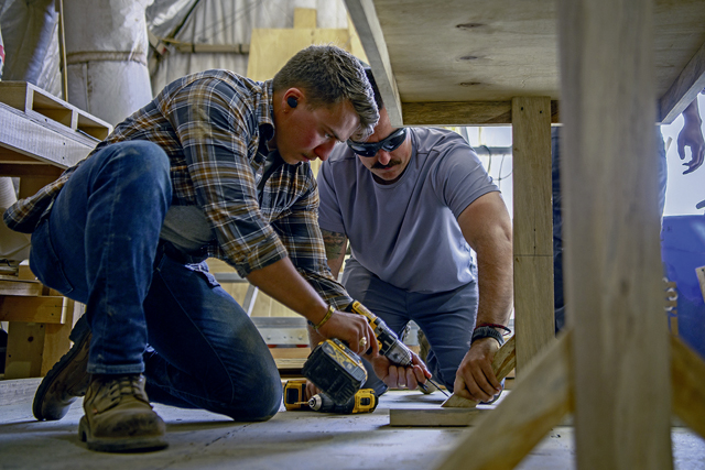 US service members at AB 201 build desks for Agadez schoolchildren